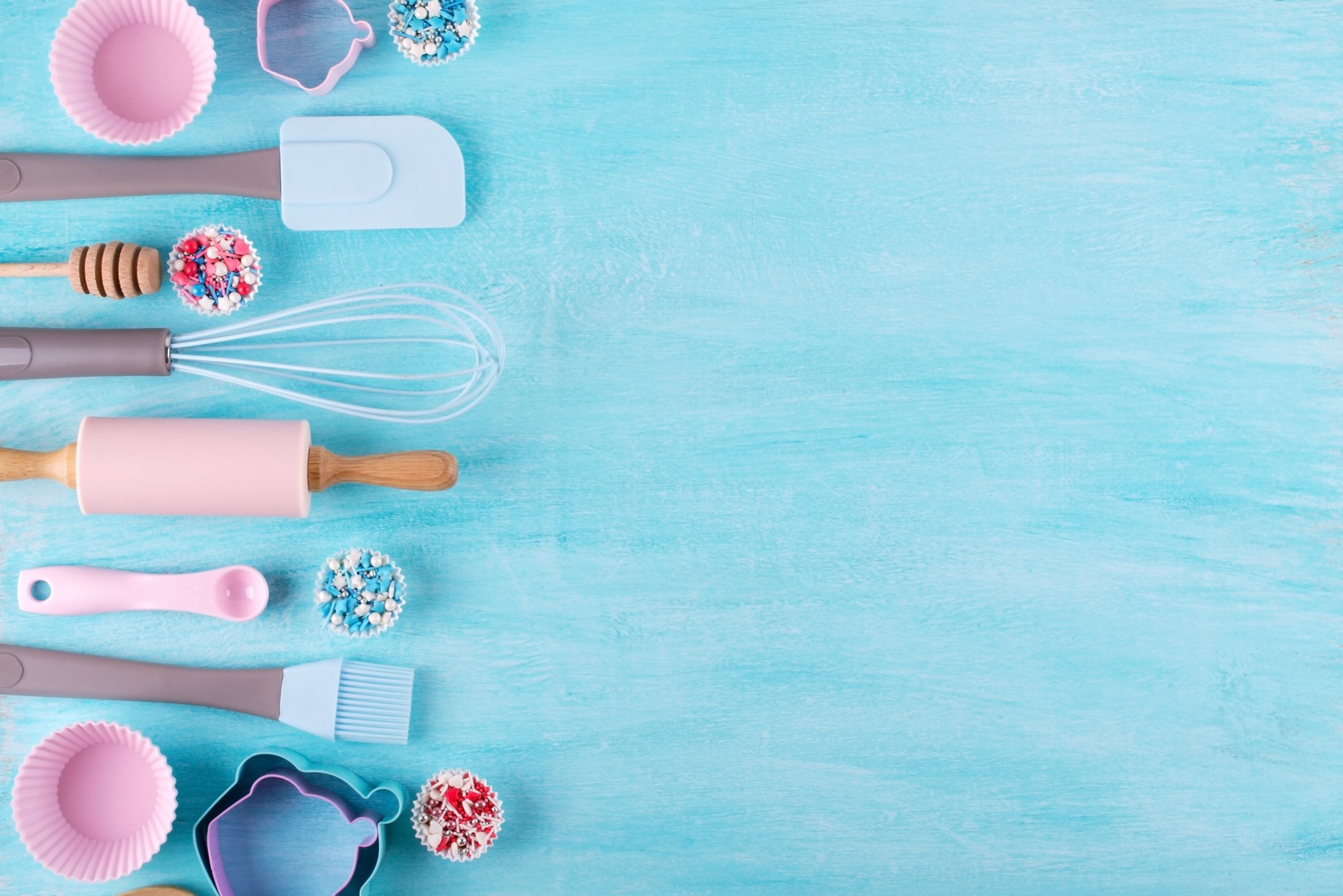 Various kitchen baking utensils. Flat lay. Top view, mockup for recipe on blue background.